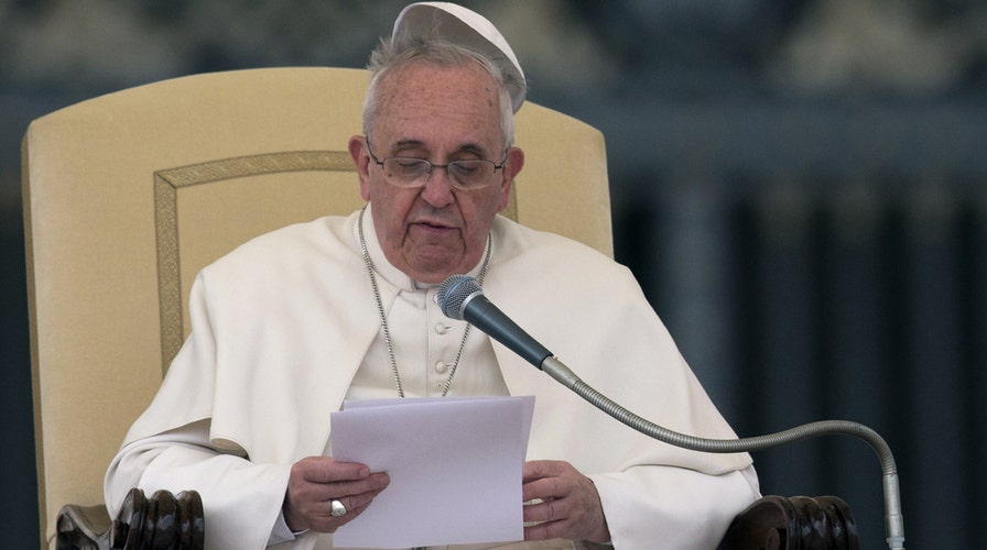 What is hiding under the pope's hat? 