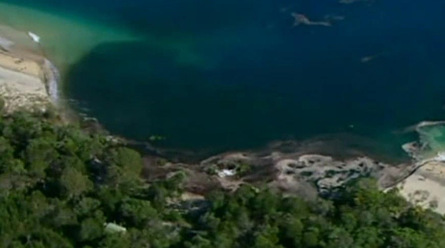 Massive sinkhole opens on Australian beach