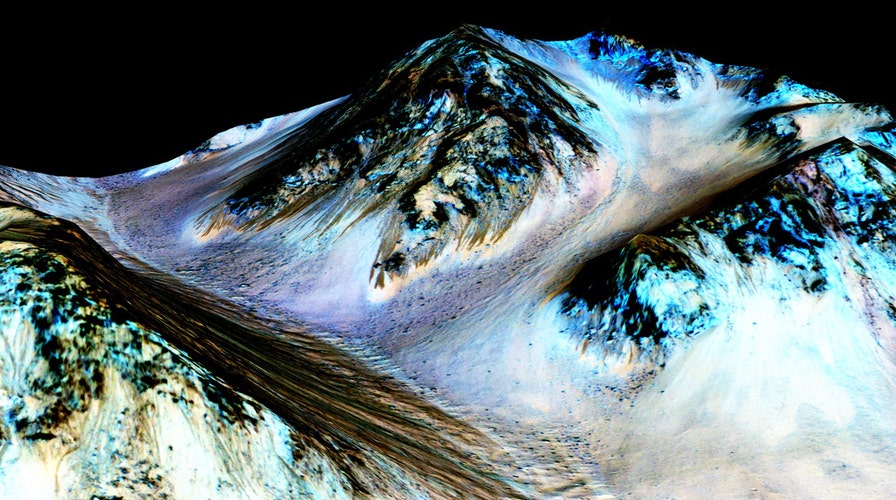 NASA confirms evidence that liquid water flows on Mars