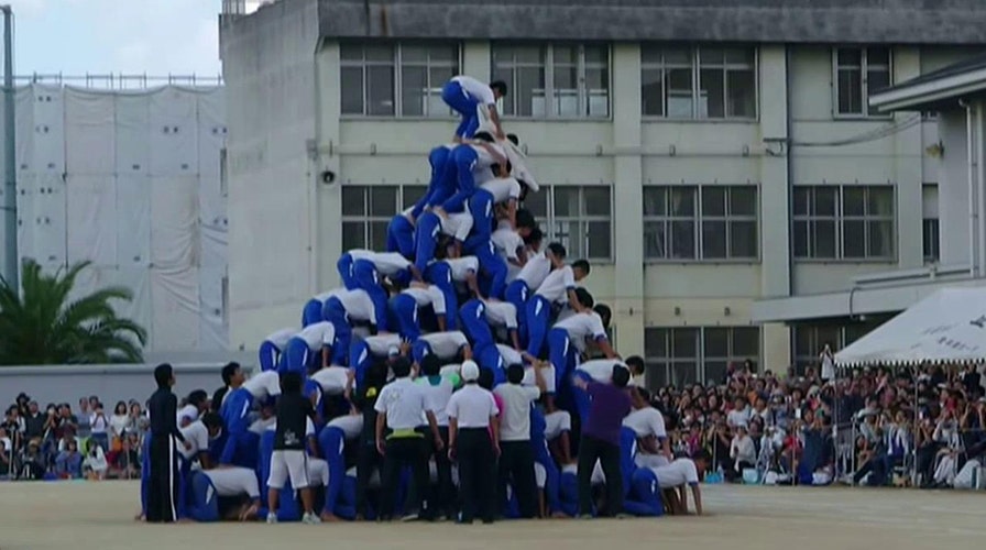 Plummeting pyramid! Students injured attempting stunt