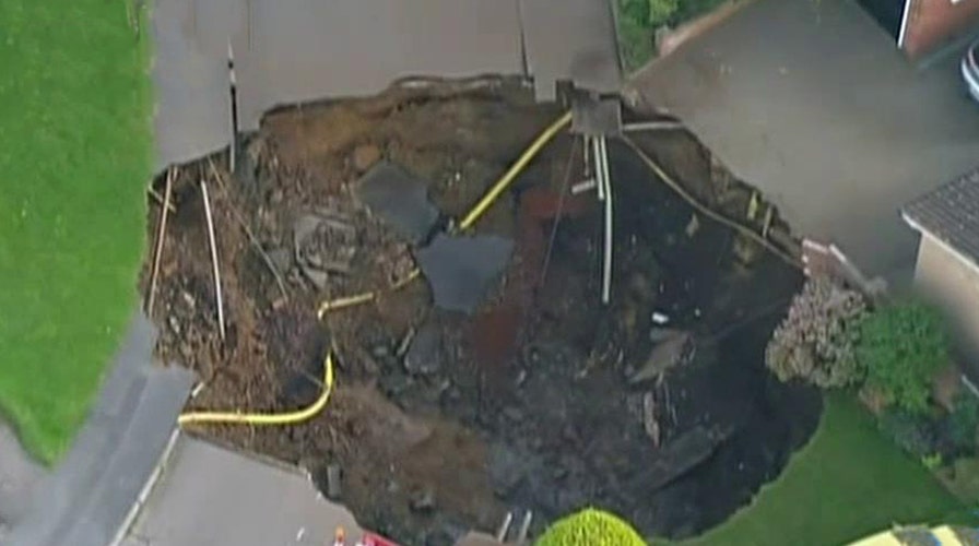 Giant sinkhole swallows up London street