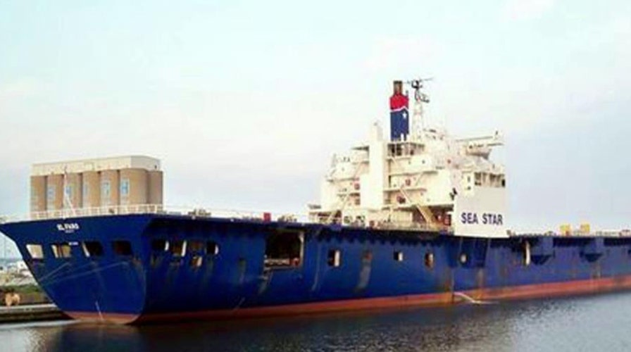 Search under way for container ship caught in hurricane