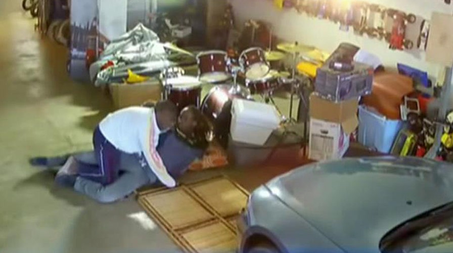 Man wrestles armed intruder, stops robbery