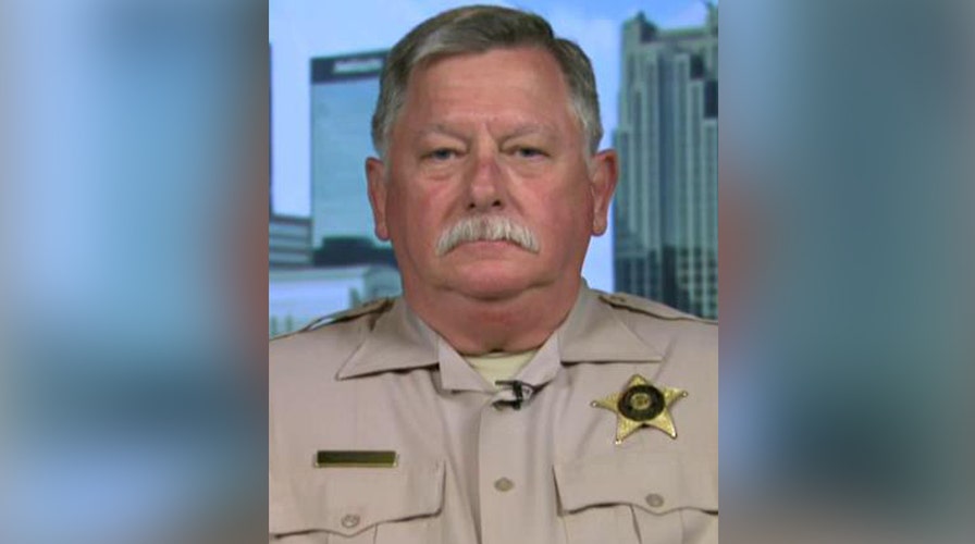 Sheriff's deputy captures hearts by calming baby after crash