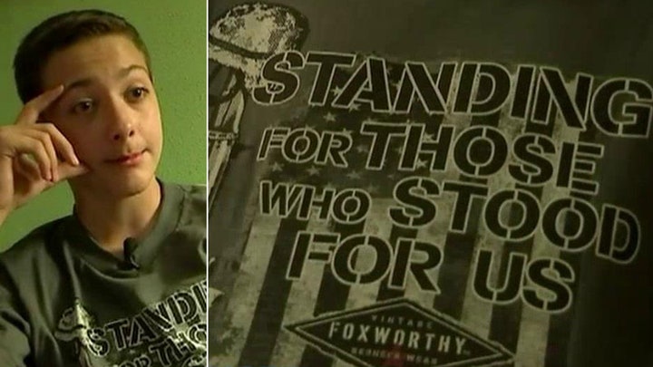 Boy suspended for wearing military T-shirt