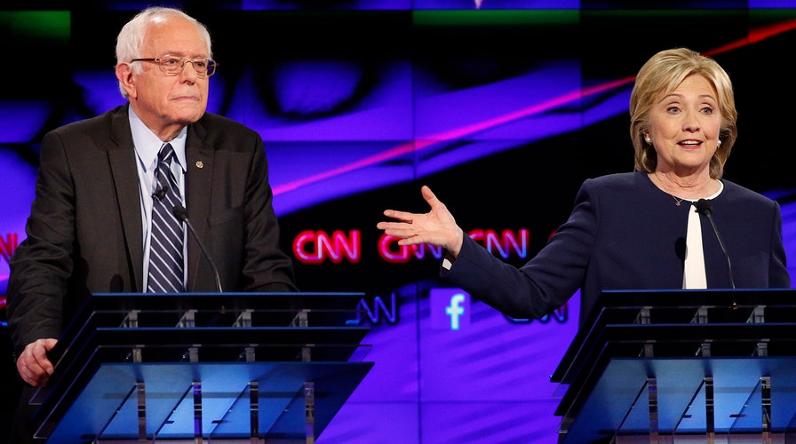 Clinton and Sanders dominate spotlight in first debate