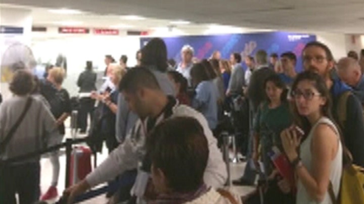 Airport agony: Computer outage causes major disruptions