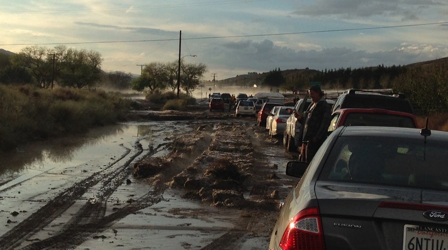 Calif. flooding traps vehicles, leaves drivers stuck in mud