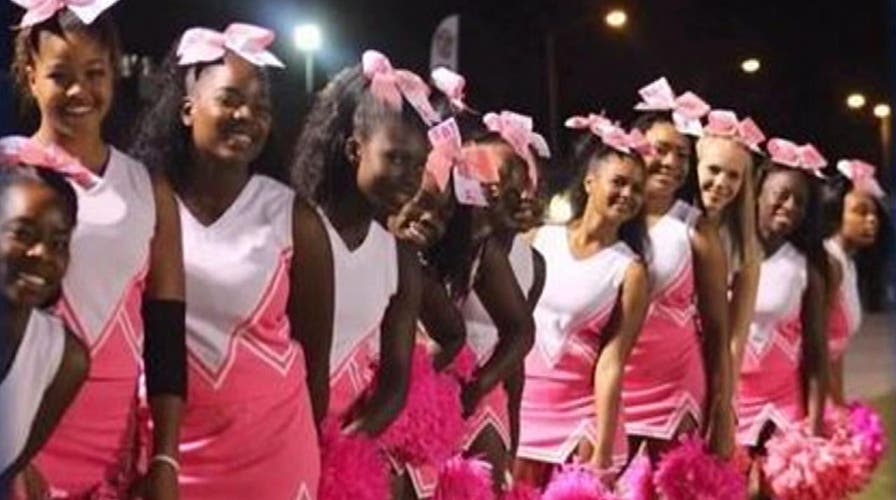 District bans breast cancer awareness cheerleading uniforms