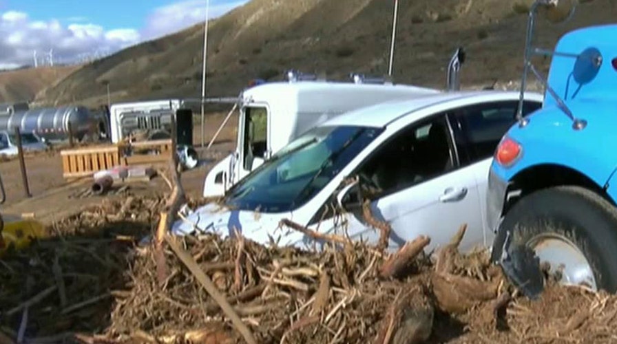 Vehicles trapped after mudslides hit major Calif. highway 
