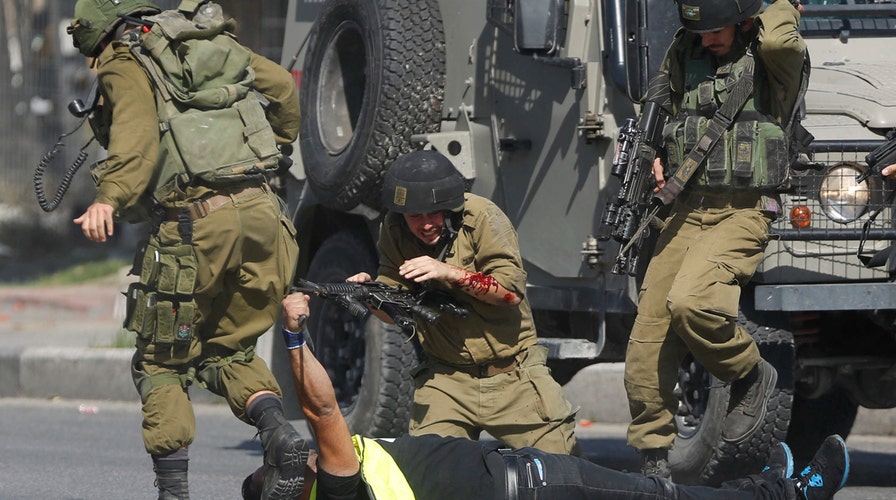 Tensions rise in Israel as soldiers defend against stabbings