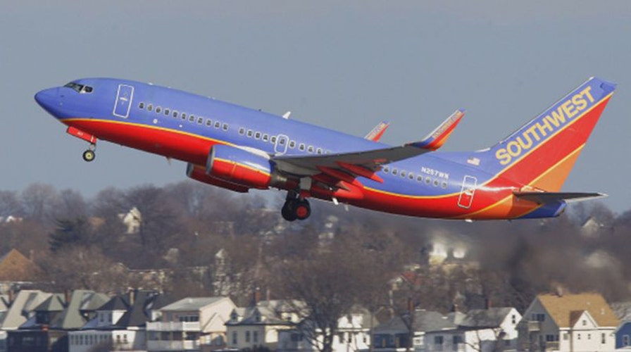 Man chokes woman on plane over reclined seat