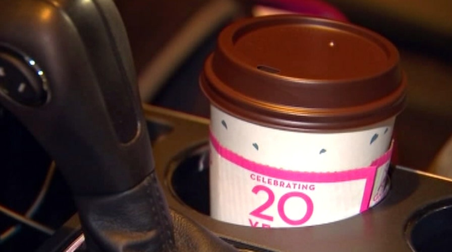 Driver claims she was pulled over for drinking coffee