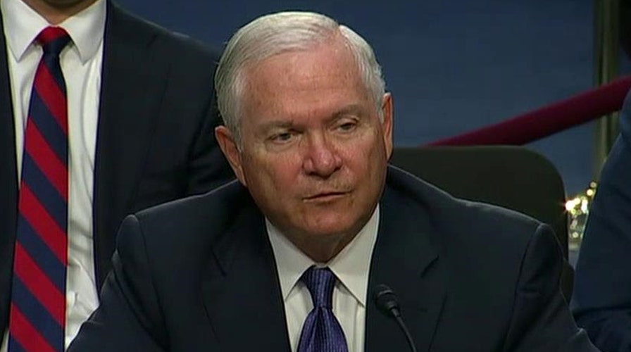 Former Pentagon chief Robert Gates speaks before Congress