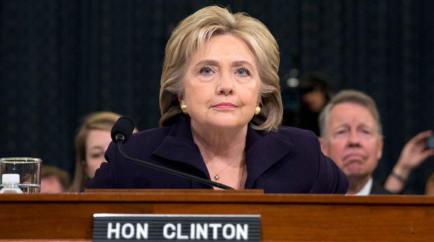 Clinton defends record as lawmakers press for answers