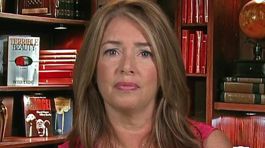 Mom of slain officer: Killing must stop, Blue lives matter