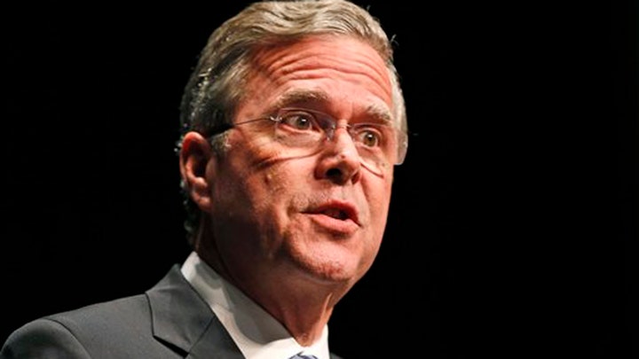 Jeb Bush downsizes campaign as Ben Carson surges in Iowa
