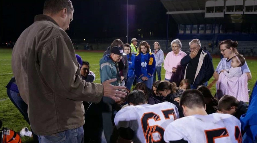 Football coach suspended for continuing post-game prayer