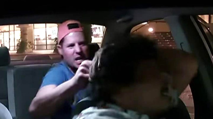 Passenger's assault on Uber driver caught on camera