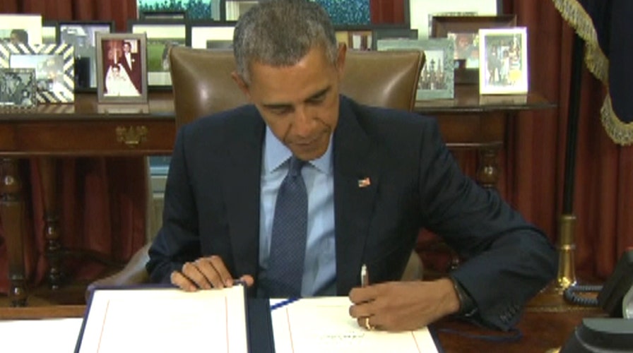 President Obama signs 2-year bipartisan budget deal