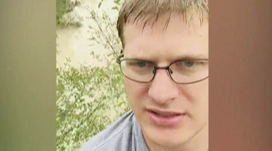 Caught on Camera: Stranded in a tree, surrounded by a flood