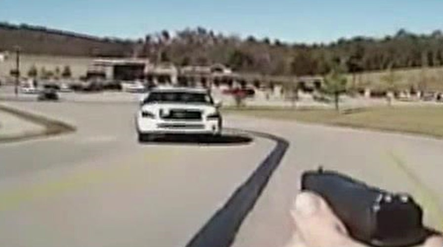 Video shows vehicle slamming into cop car