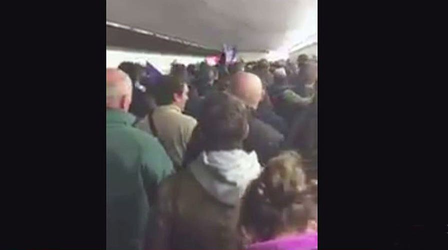 French crowd sings national anthem after Paris attacks