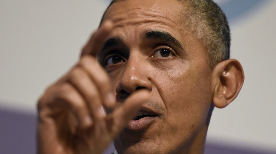 Obama defiantly defends evolving strategy to fight ISIS