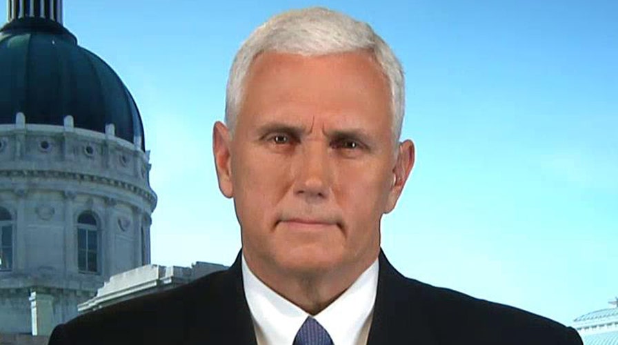 Indiana governor defends barring refugee family from state