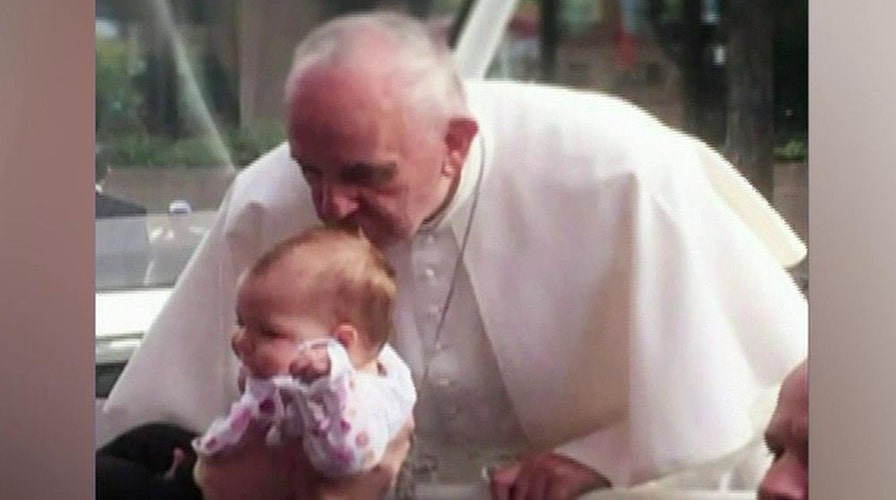 Baby's brain tumor shrinks after kiss from the pope
