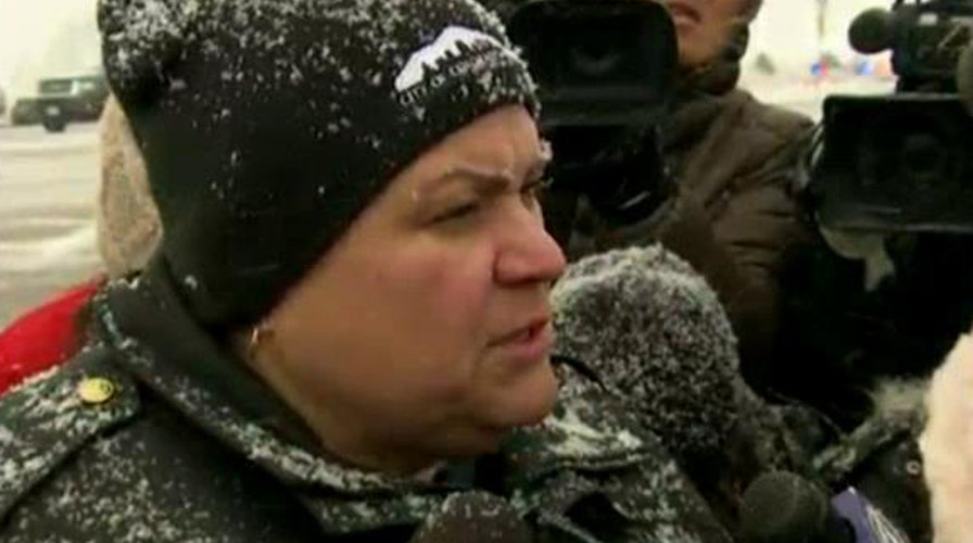 Police: Gunman located, still firing at officers