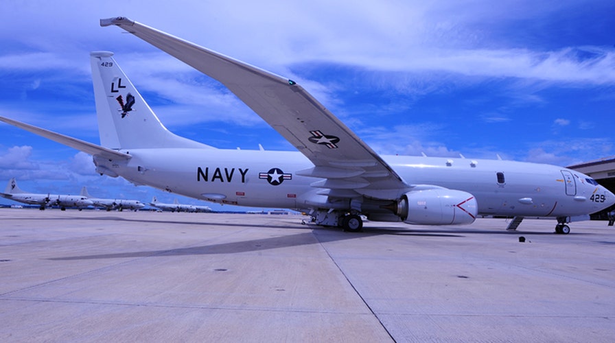 War Games: Navy's powerful spy plane heads to China
