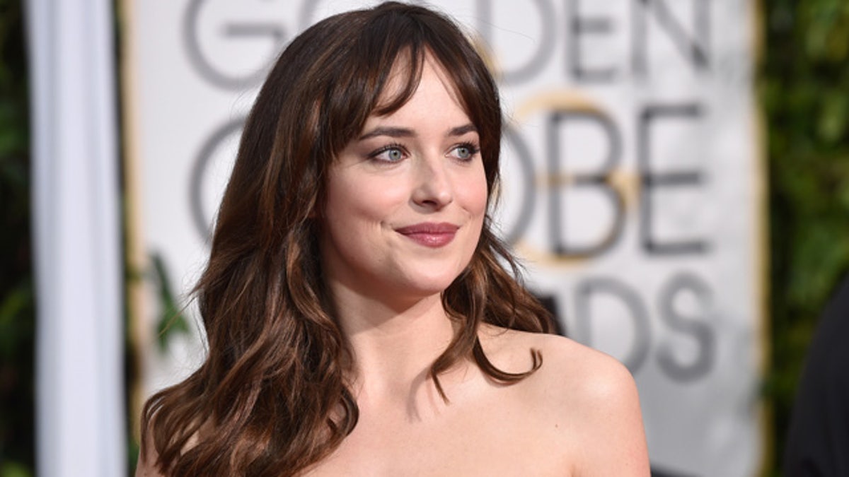 Dakota Johnson nearly showed her boobs on People's Choice stage