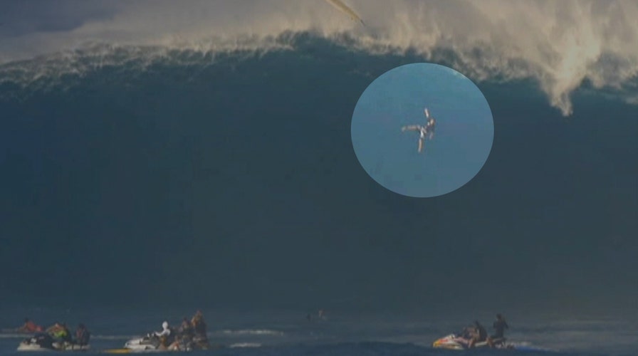 Surfer falls 40 feet in epic wipeout on monster wave