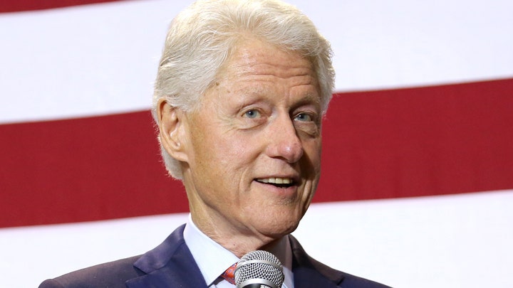Bill Clinton slams 'awful legacy of the last eight years'