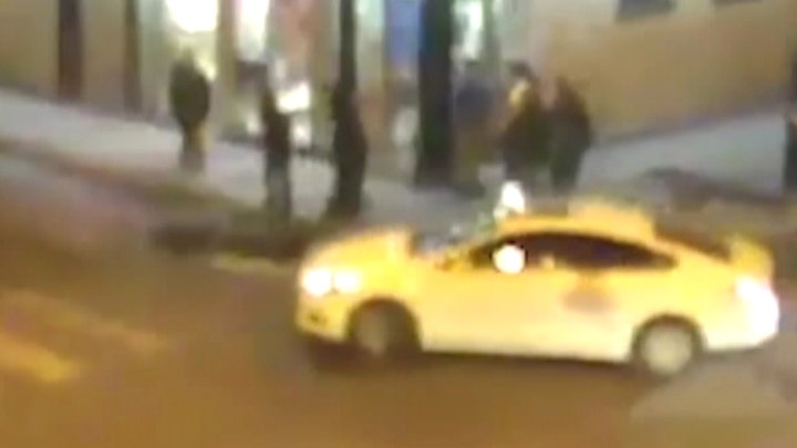 Man dies after getting knocked out, robbed, run over by cab