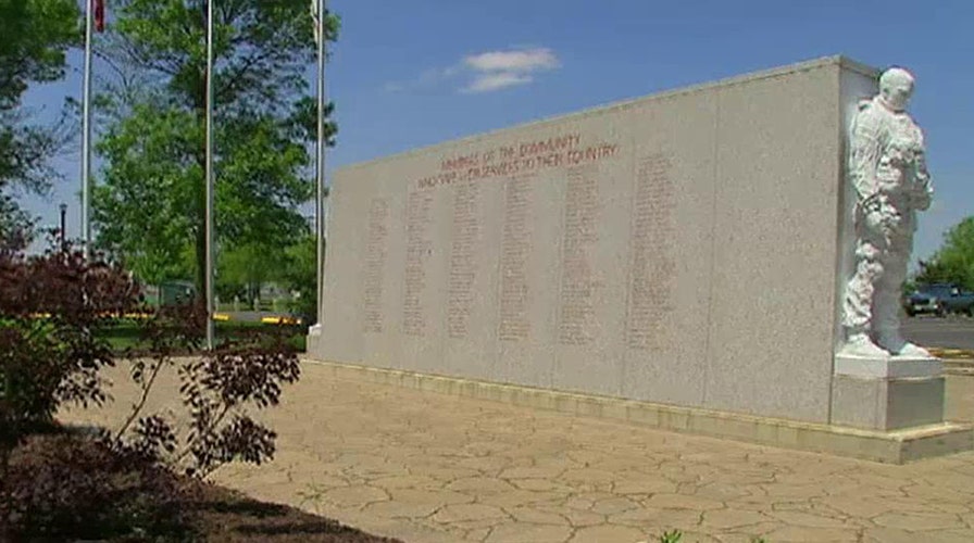 Small town artist sculpts magnificent tribute to Vets