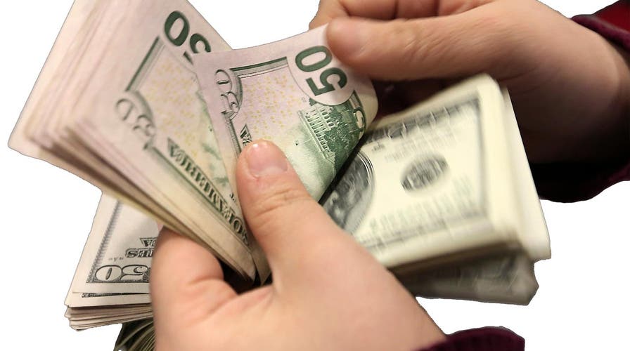 Americans are making more, spending more