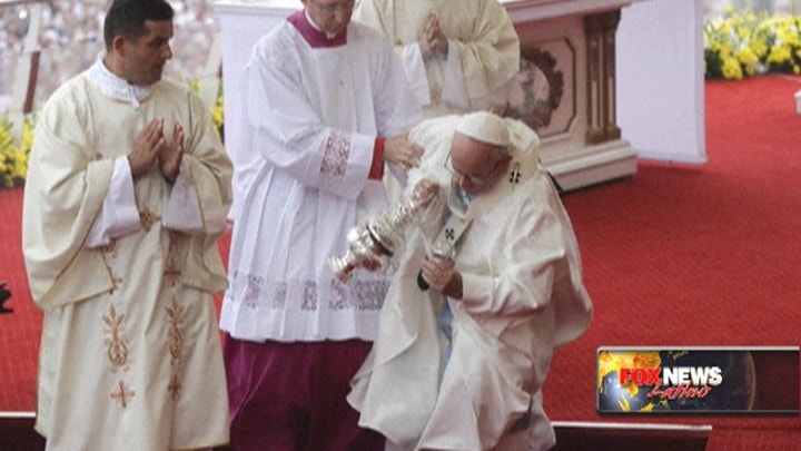 Pope Francis falls during Mass in Poland