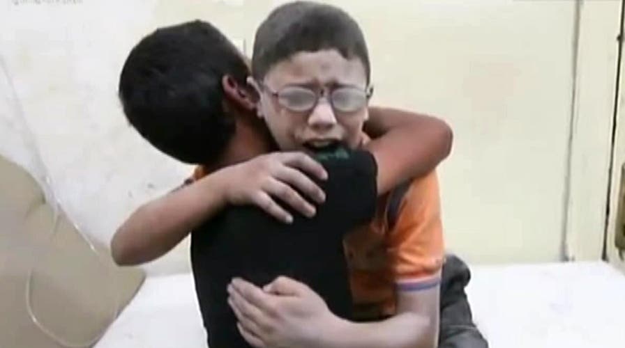 Tragic video of Syrian boys grieving over killed brother