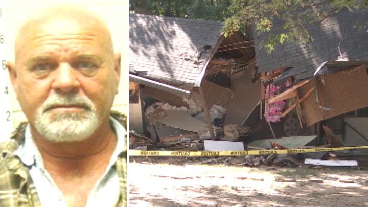 Feud allegedly leads to man bulldozing neighbor's home