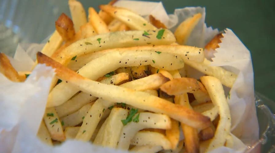 Arrested for stealing cop's French fries?