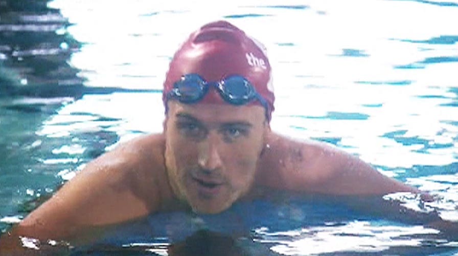 Ryan Lochte gets back in the pool