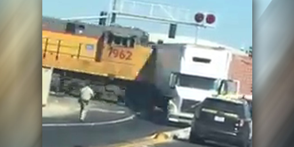 Moment Of Impact: Train Smashes Into Truck Stuck On Track | Fox News Video