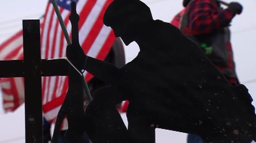 Cross restored to military memorial in Minnesota