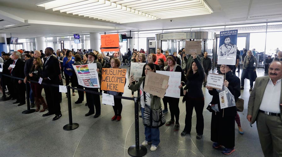 Power Play: Democrats unite against Trump's travel ban