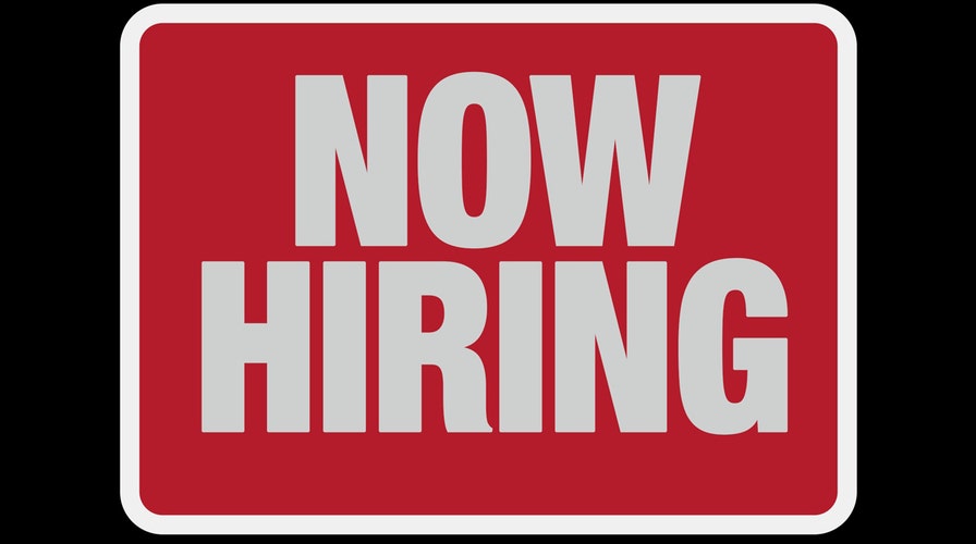 There are lots of new employees walking around the workplace