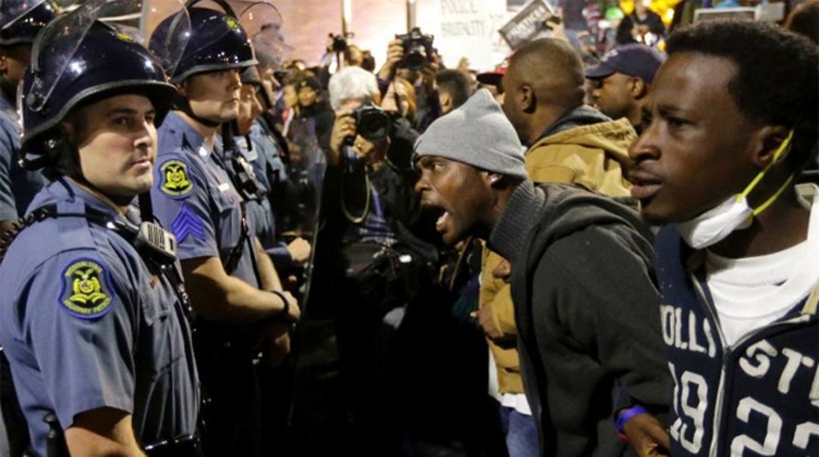 Mounting anti-police protests fuel new worries in 2015