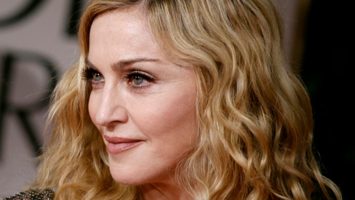Madonna lets young son drink alcohol?