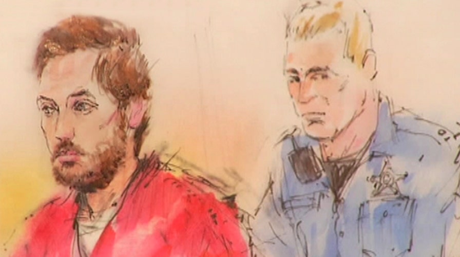Tearful testimony in theater shooting suspect's hearing